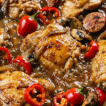 Chicken Murphy with Italian sausage bell peppers mushrooms and hot cherry peppers in white wine sauce