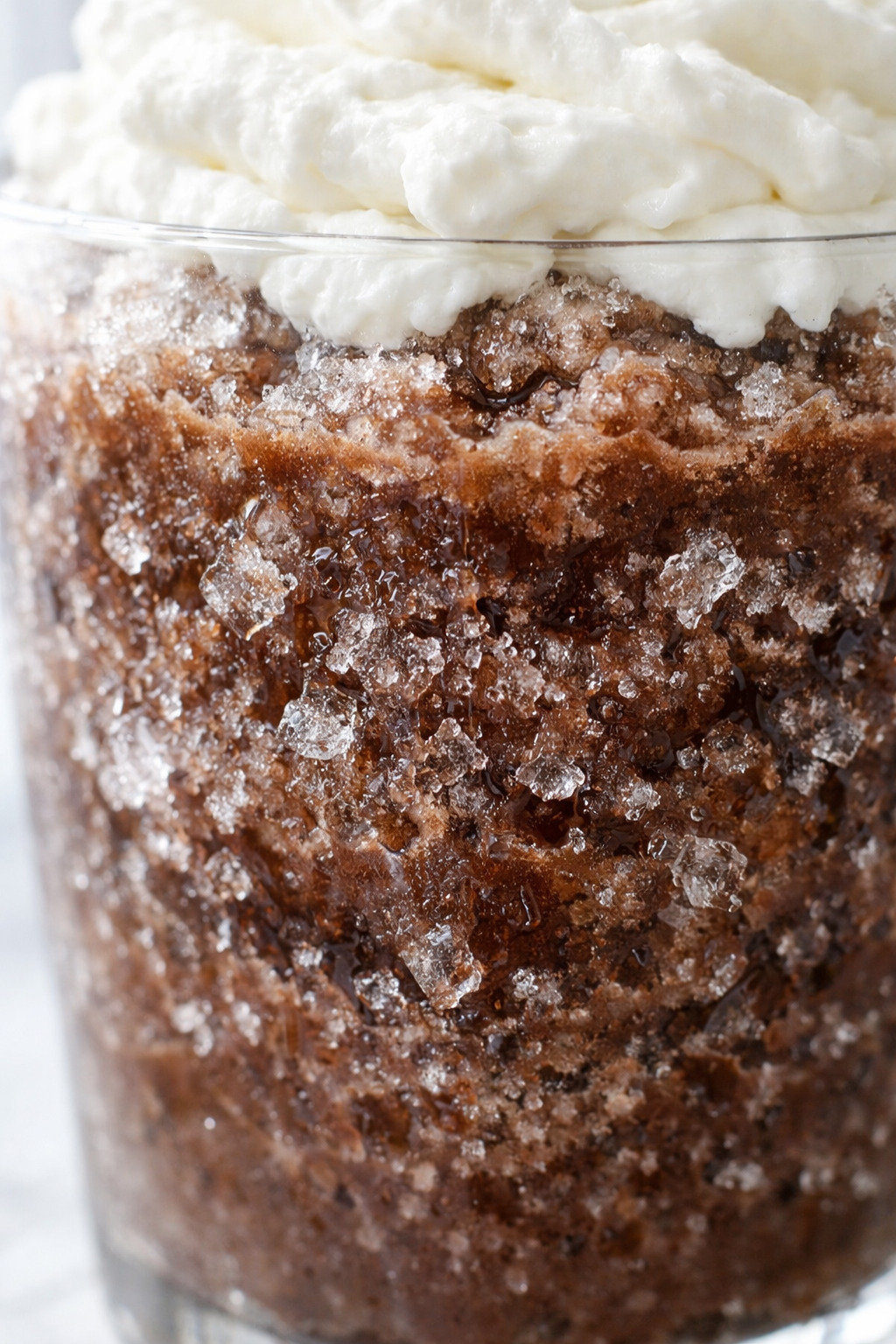 Closeup of frozen hot chocolate showing icy chocolate slush texture